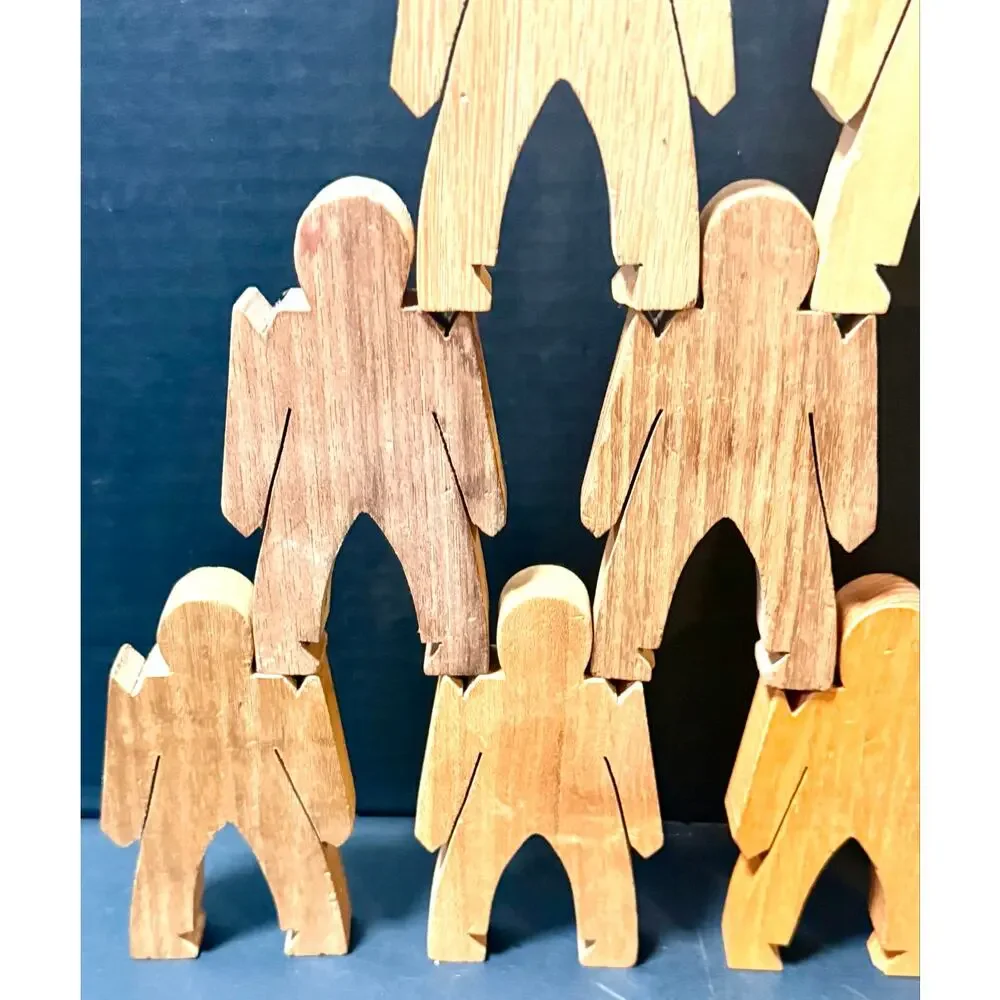 Wooden Stacking Dudes interlocking human shaped made of multiple woods